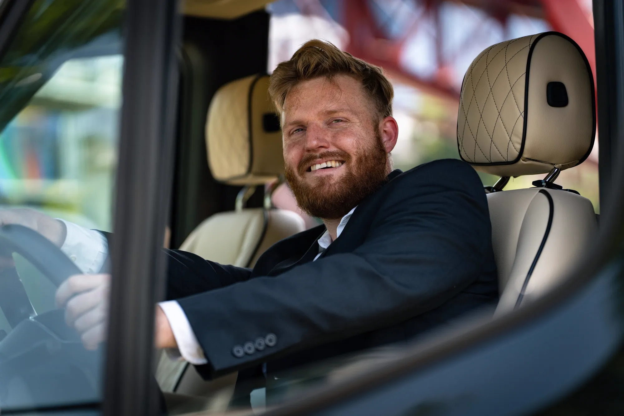 Executive seated and at ease in a captain's chair inside the Jet-Style Sprinter